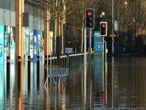 Flooded street with shopping trolley